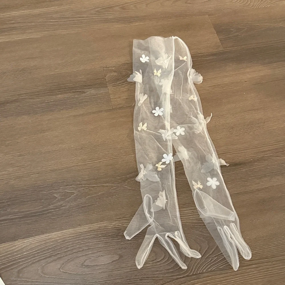 New Opera length tulle butterfly and bow embellished globes